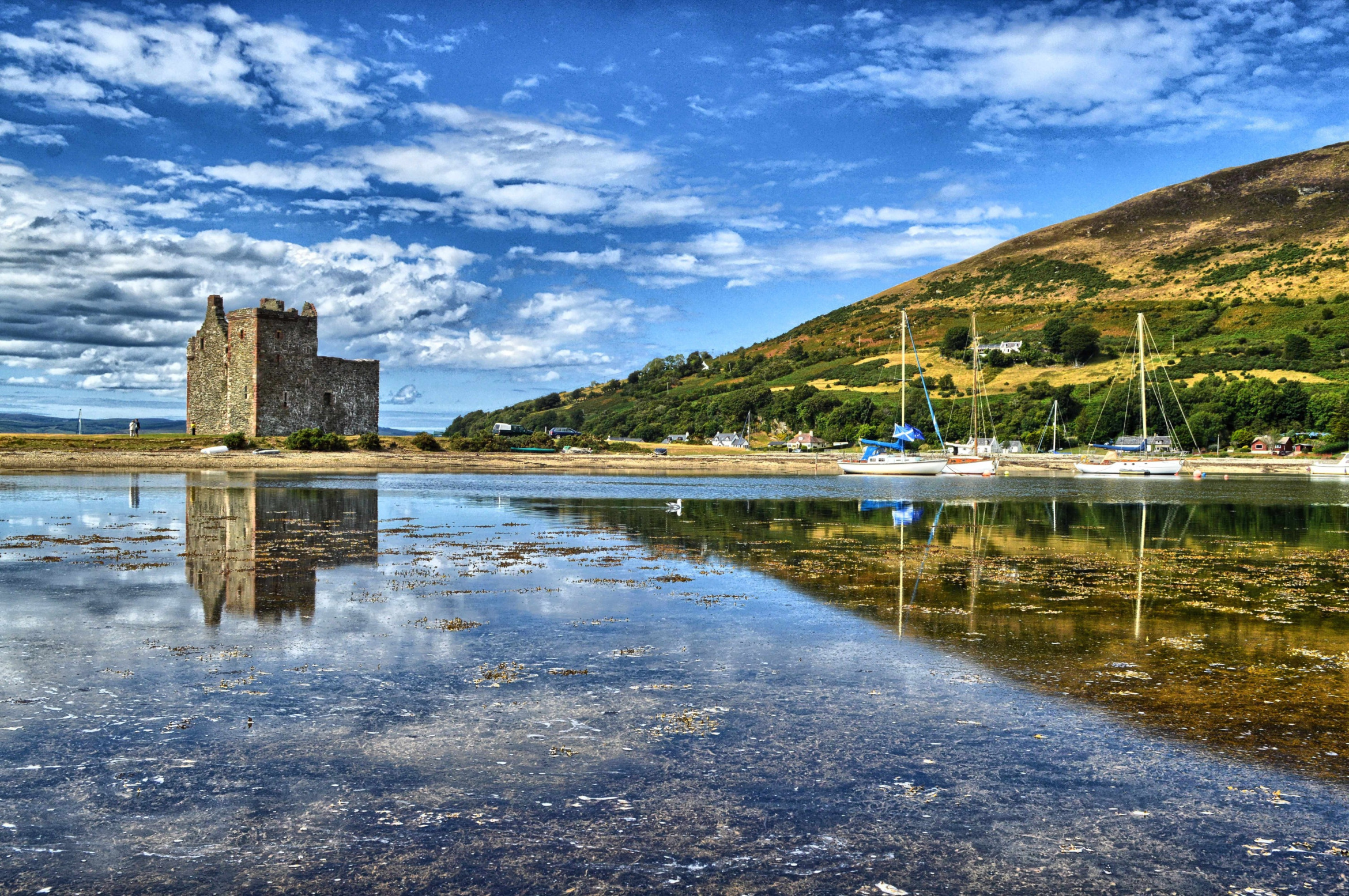 Lochranza Castle on the Isle of Arran (Scotland, UK); Detective Team Isle of Arran (Scotland, UK), Private Detective Isle of Arran (Scotland, UK), Corporate Detective Isle of Arran (Scotland, UK), Private Investigator Isle of Arran (Scotland, UK)
